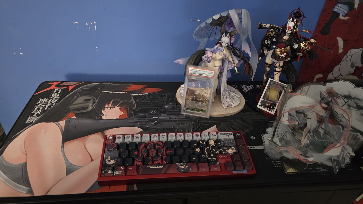 xapo97's tweet photo. A small wakamo shrine has started with the S.Wakamo figure coming home!
Just need a wall scroll of her and Nexon to drop a nendoroid and chocopuni plush and the main parts of the shrine would be complete! https://t.co/I2kXKsusWH