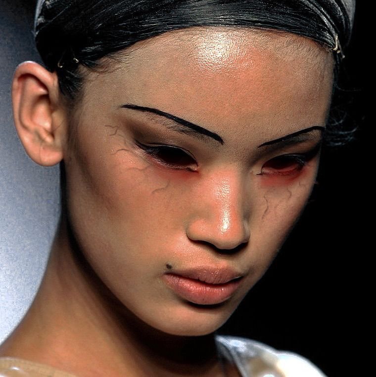 BRELLAFASHION's tweet photo. Runway Makeup at jean paul gaultier spring 2009 https://t.co/4uVgR1psiR