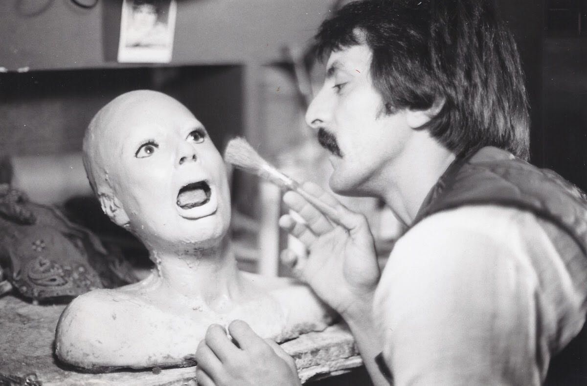 Whenever I see behind-the-scenes pics of Tom Savini at work, he always looks like a vet who's taking care of a frightened, wounded animal.