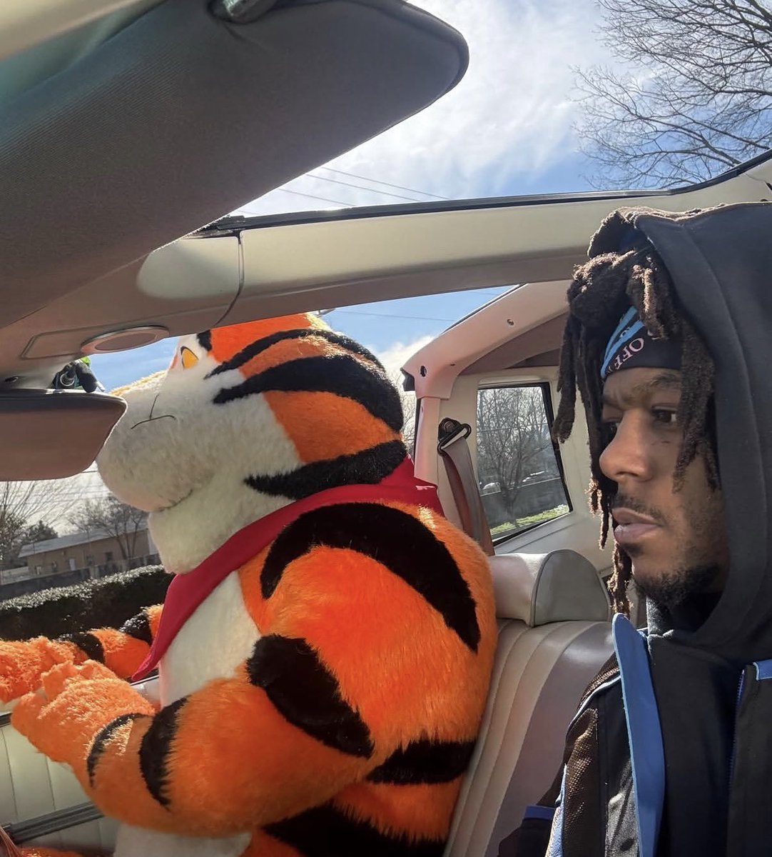 homie sittin passenger talkin bout “you ain’t earn ya stripes yet”