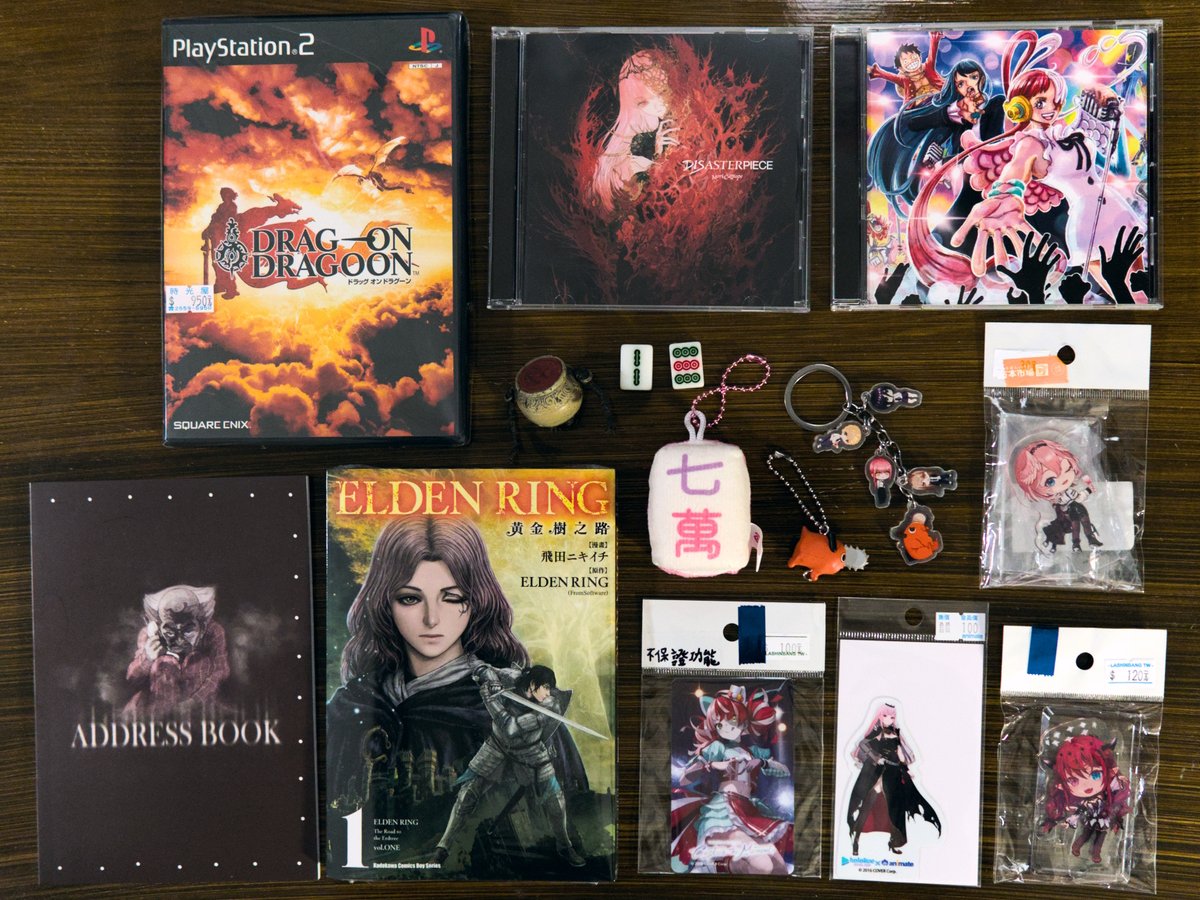 TipsyNode's tweet image. My loot from my trip to Taipei. Was desperately looking for a Hakos Baelz keychain I could clip to my camera, but alas... 

Disasterpiece fucking rules tho, bummed out I couldn't find the limited edition. D: