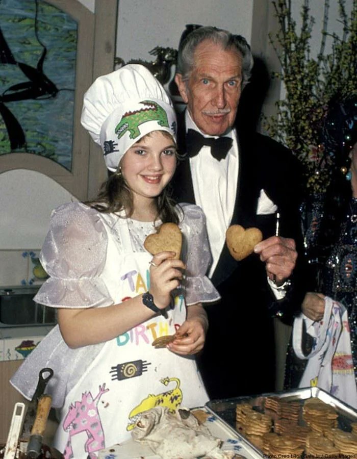 Drew Barrymore and her grandfather's friend Vincent Price together in 1984