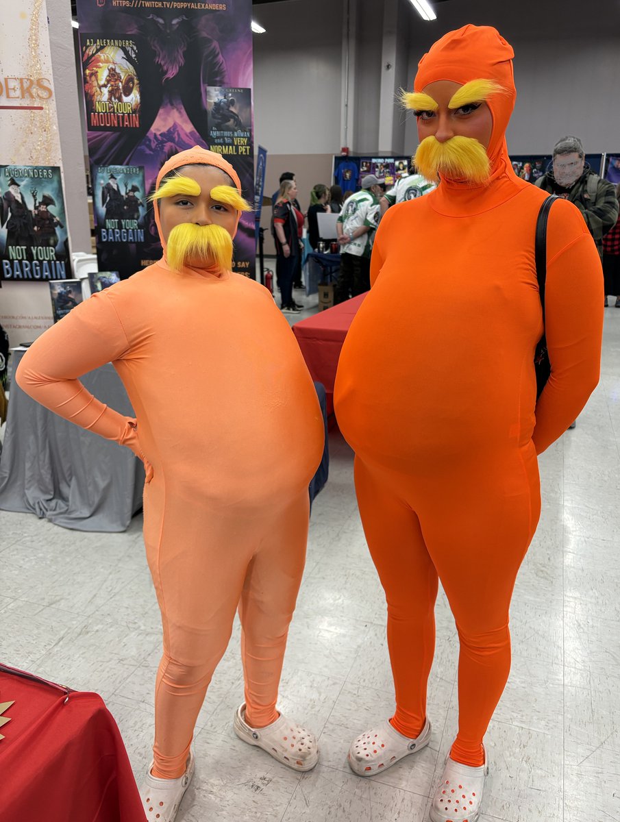 I gotta admit I'm not sure which Seuss characters these are, but these two were hilarious at #albuquerque #comiccon 2026. They belly bumped as soon as the photo was taken. #cosplay