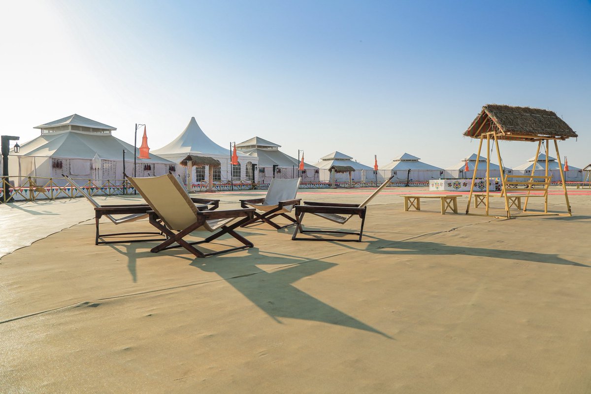 abumetha's tweet photo. The Tent City in Gujarat, set up for the Rann Utsav, is a truly unique destination that offers unforgettable experiences.

Located beside the vast white salt desert, surrounded by vibrant villages and local communities rich in tradition and cultural heritage, and close to ancient civilisation sites, there is so much to explore and enjoy.

The Tent City itself features world-class facilities comparable to top-notch resorts, with luxury tents, traditional bazaars, cultural performances, arts and textile museums, adventure activities, gourmet cuisine, and much more. The warm and hospitable staff ensure a wholesome Gujarat experience - showcasing the state’s history, tourism highlights, traditional handicrafts, ancient art forms, and delightful retail therapy.

It is a perfect getaway, a must-do experience, and a true bucket-list destination. You will return with memories to cherish for a lifetime.