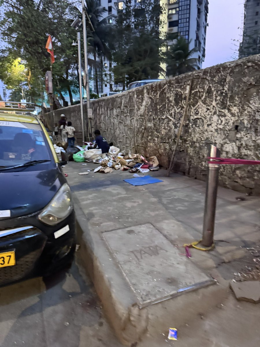 This is from last evening at #lowerparel. Every evening they block the footpath to sort garbage. Pls take strict action and remove them from the area <a href="/mybmcWardGS/">WARD GS BMC</a> <a href="/mybmc/">माझी Mumbai, आपली BMC</a> <a href="/TOIMumbai/">TOI Mumbai</a>