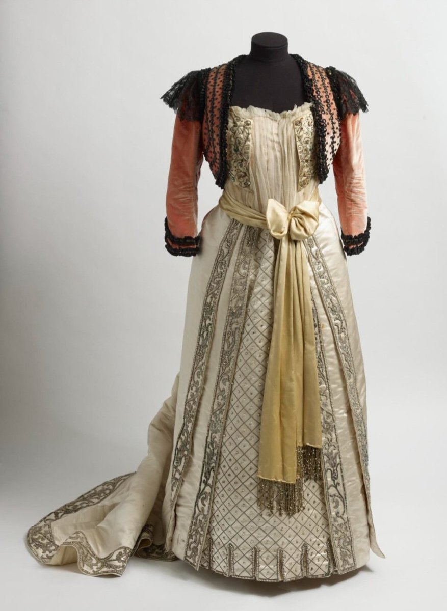 vickyhaddock's tweet image. Italian opera singer Adelina Patti was born #OnThisDay in 1843. She wore this Morin-Blossier designed embroidered, cream silk satin dress with a salmon pink bolero trimmed with black lace and beading, on stage at Covent Garden in 1895. @LDN_Museum collection. #fashionhistory