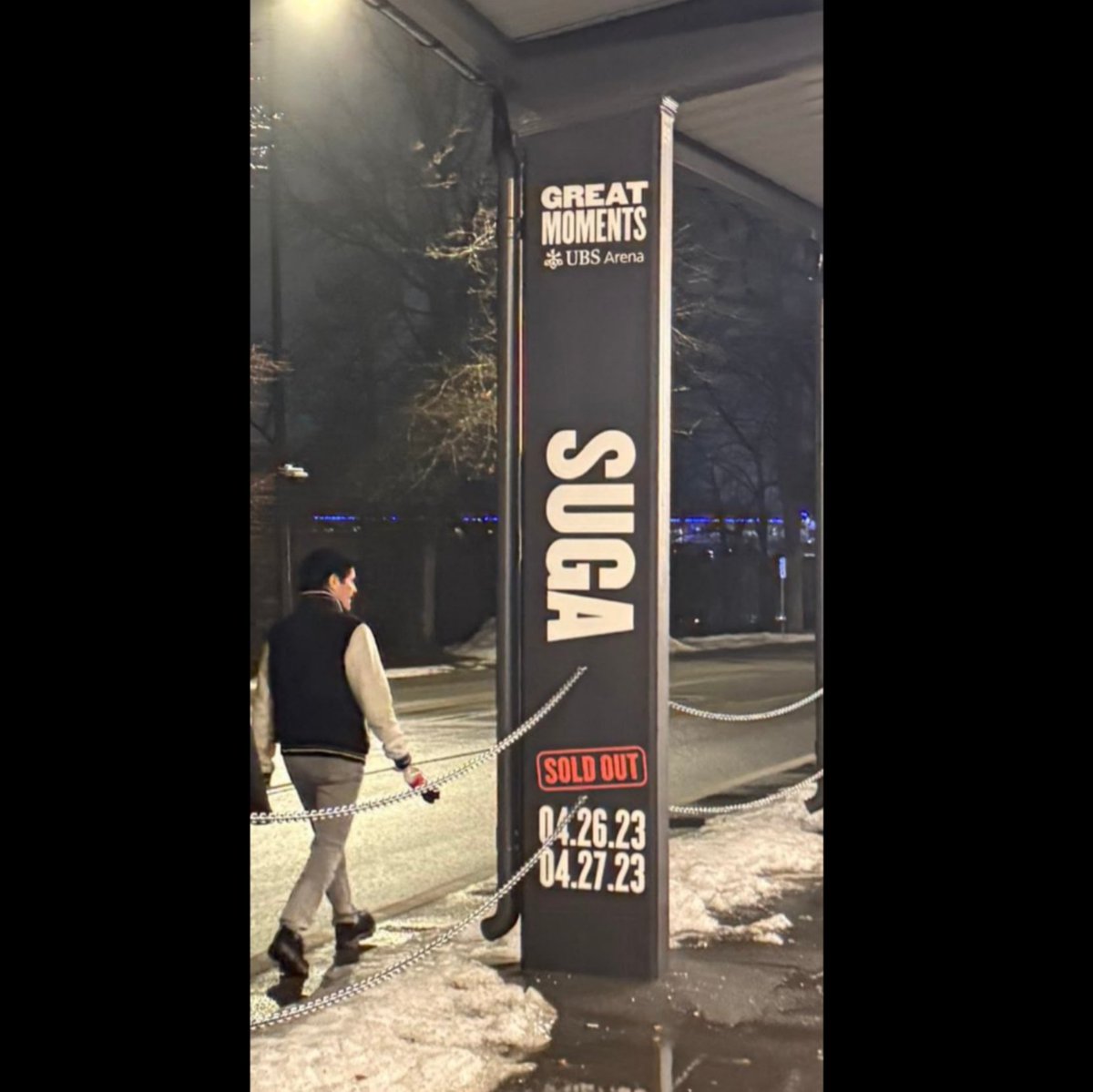 SUGA has been officially honored at UBS Arena in New York with a feature in the "Great Moments" installation. This permanent outdoor display commemorates historic, sold-out performances and major events that have shaped the venue's legacy since its opening in 2021.