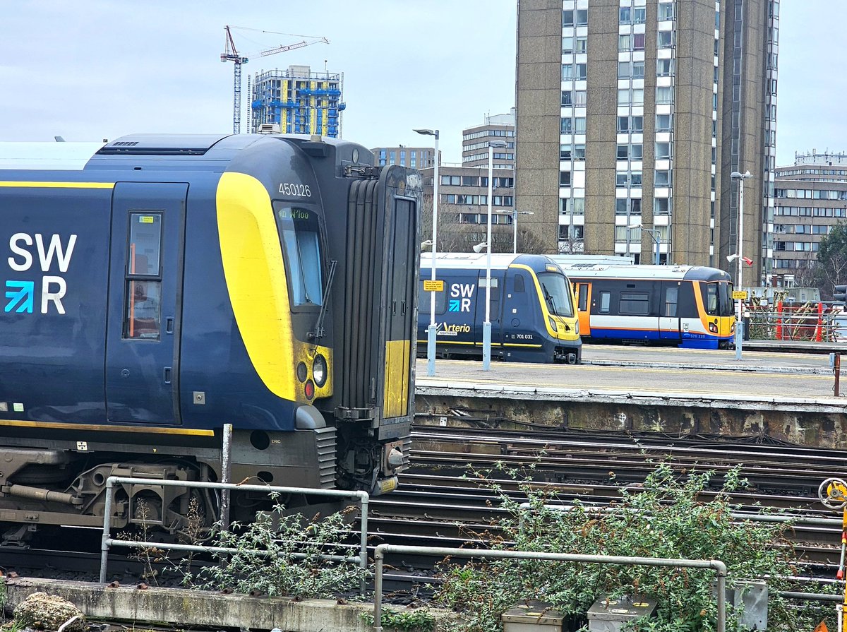 Harrod15S's tweet photo. Triple unit line up at #ClaphamJunction yesterday morning 18/02/26 as #SouthWestern 450126 & 701031 & #Londonoverground 378220 await there departures #London https://t.co/r7OfyBycHH