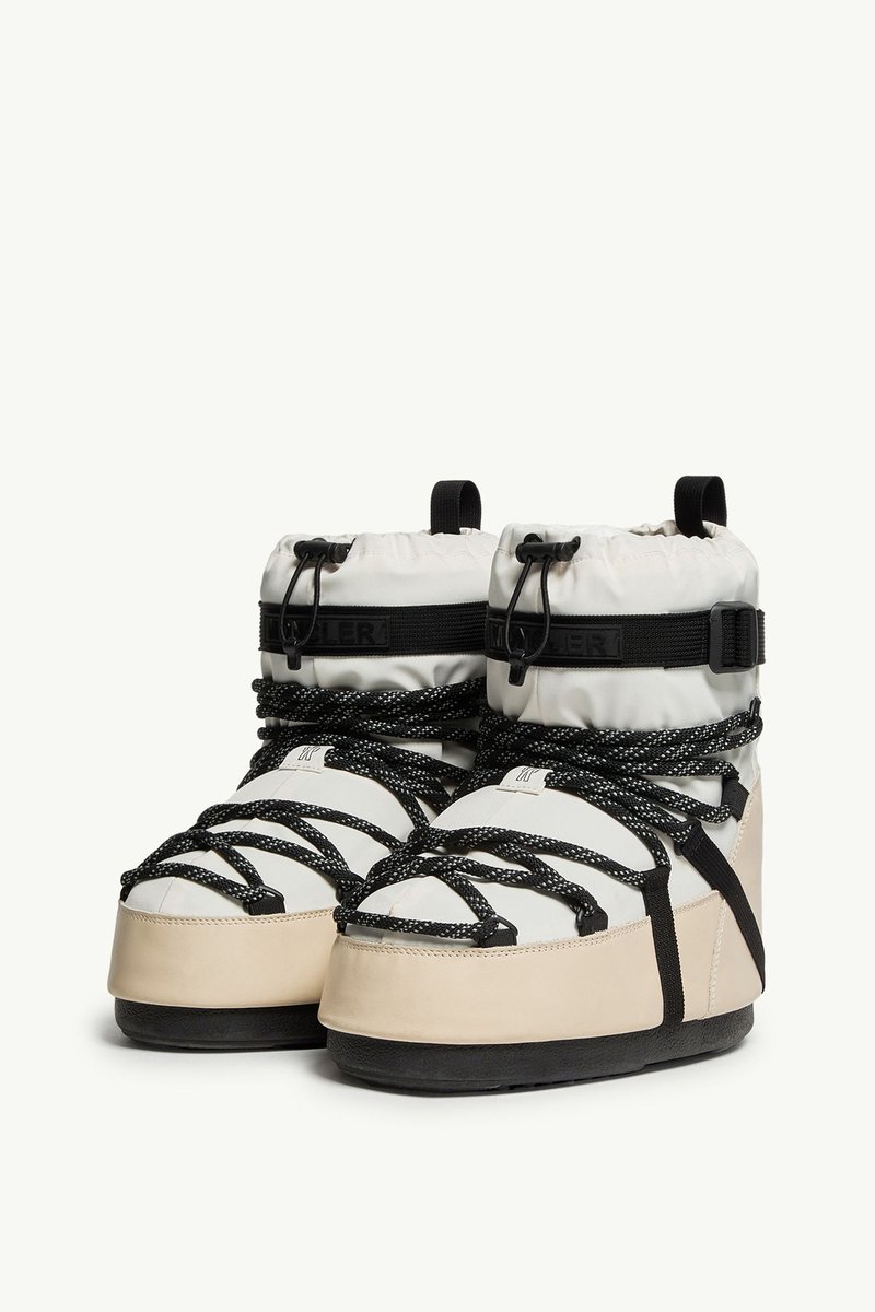 Sho with the cutest snow boots 😆😆. I have a feeling that this man went to shop the entire collection for this Olympic season. 

Moon Boot x Moncler Grenoble Icon Low Padded Snow Boot.
