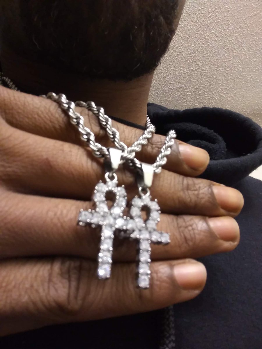 Double the power. Double the shine. ✝️💎 Iced Ankh crosses on heavy rope chains — timeless symbol, heavyweight presence. Faith meets flawless drip.

#HipHopBling #AnkhPendant #CrossPendant #IcedPendant #RopeChain #MensJewelry #IcedOut #FaithAndFashion #BlingLife #UrbanJewelry