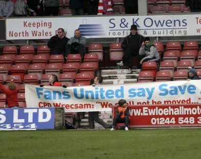 WrexhamLowdown's tweet photo. OTD 2011

Wrexham 2-7 Gateshead

15 years ago today . . .

An insane game on the pitch, but a very important day off it for fans to unite and make their voices heard.

No Wrexham fan would ever have believed then what’s happening to us now.

More pics from @78Spirit in comments. https://t.co/q5aKgzYJGu