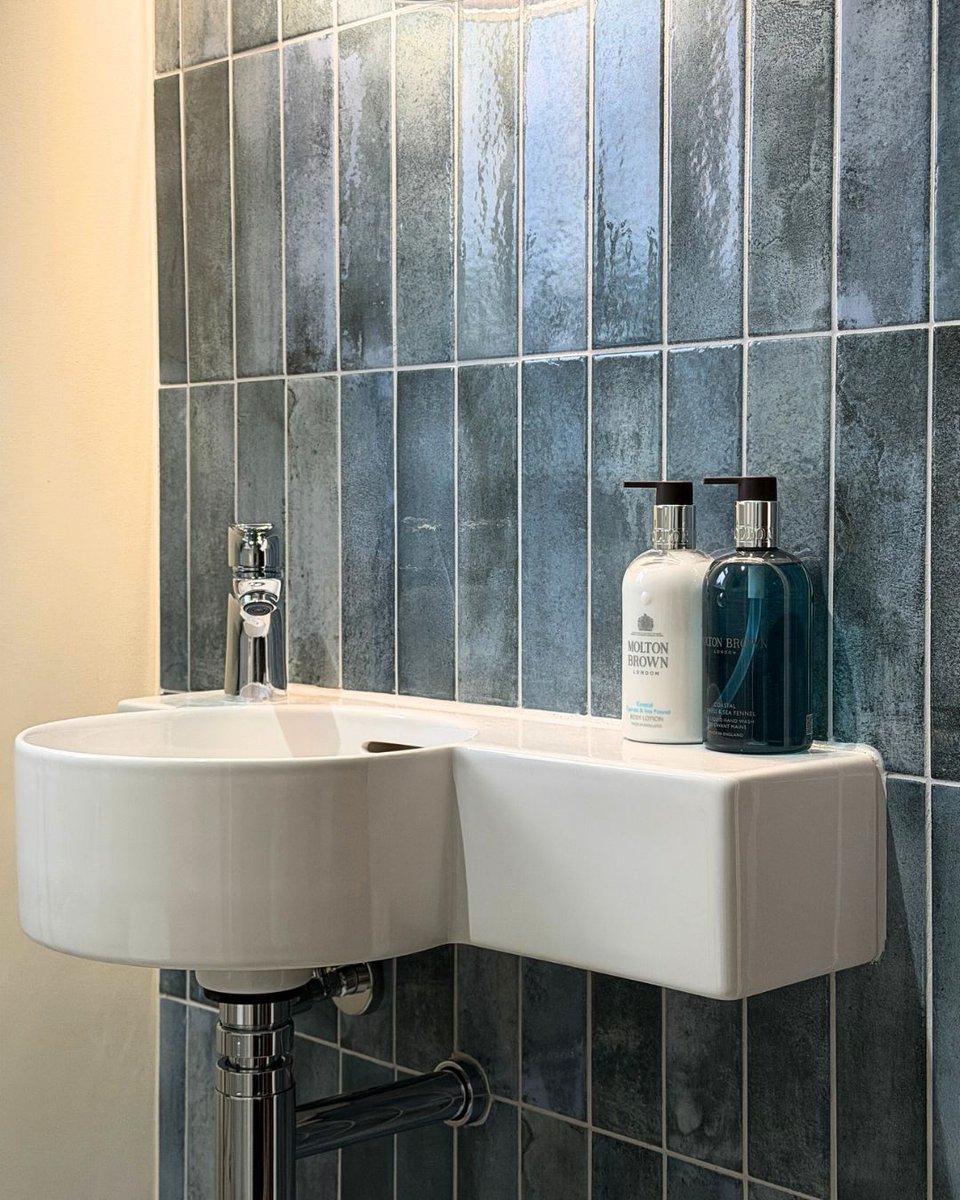 StoneAndChrome's tweet photo. 🩵 Clean &amp; stylish 🩵 
Small space, big impact!

- Laufen Pro rimless wall hung WC.
- Laufen Val washbasin.
- hansgrohe Talis E basin mixer.
- Dansani back lit mirror.
- Tiles be Minoli and Ca' Pietra.
---
📧 enquiries@stoneandchrome.com https://t.co/Z6nUpfrH2U