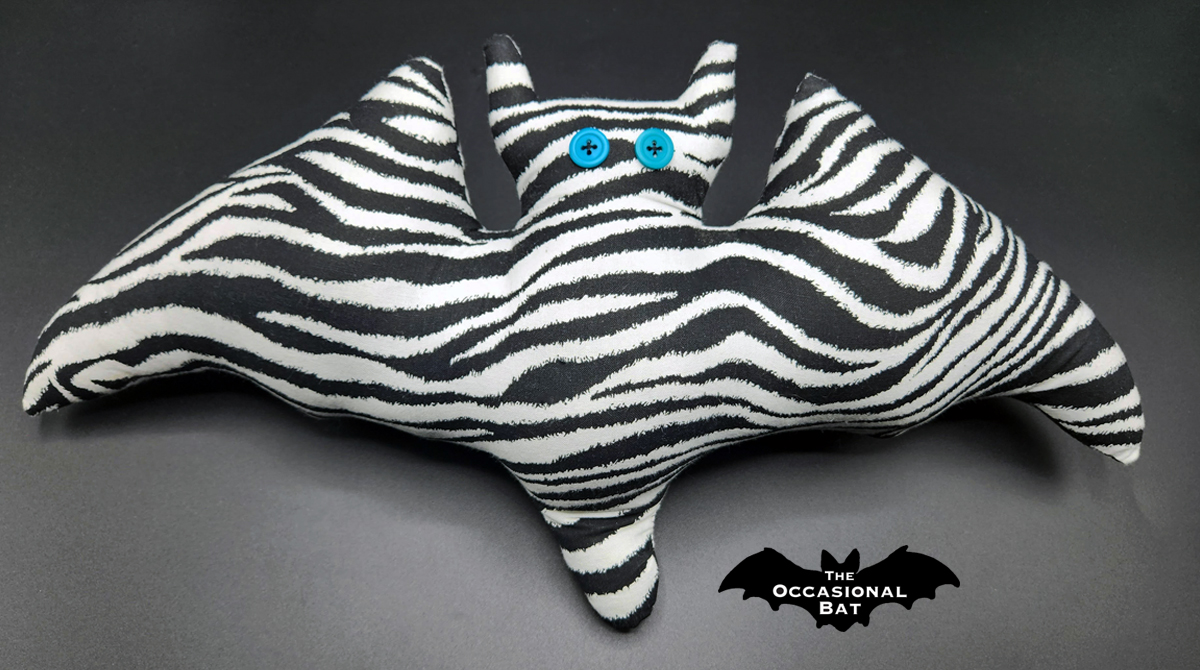 OccasionalBat's tweet photo. Stripes of style, bold and timeless! π¦β¨ Who else loves the classic black and white vibe? #ZebraLove #StripesForDays #WildAtHeart #NatureBeauty #BlackAndWhiteVibes #TheOccasionalBat #Handmade #BatShapedPillow https://t.co/Rmw7OWYcLf https://t.co/tTJFLxV9Lt