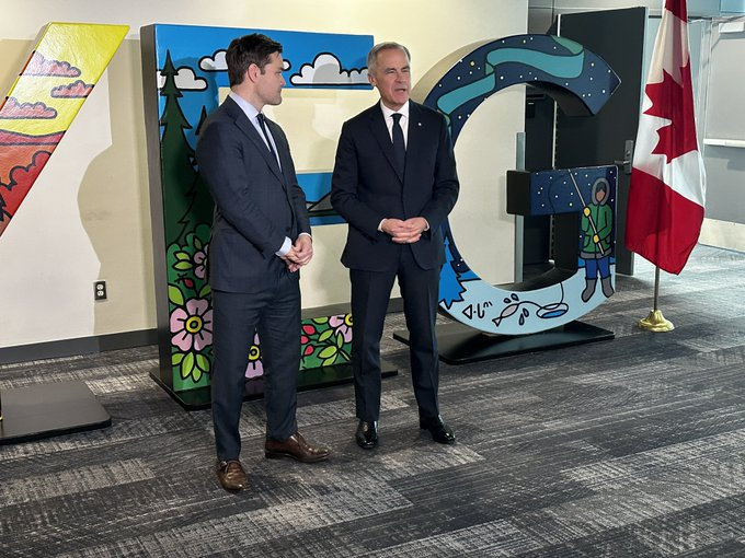 Mark Carney lives in New York.  He's an Ottawa MP, which basically makes him a temporary foreign worker.

Matt Jeneroux lives in Victoria, BC.  He announced his resignation back in November, and hasn't worked a day as an MP since then.

They both flew to Edmonton, as a theatrical