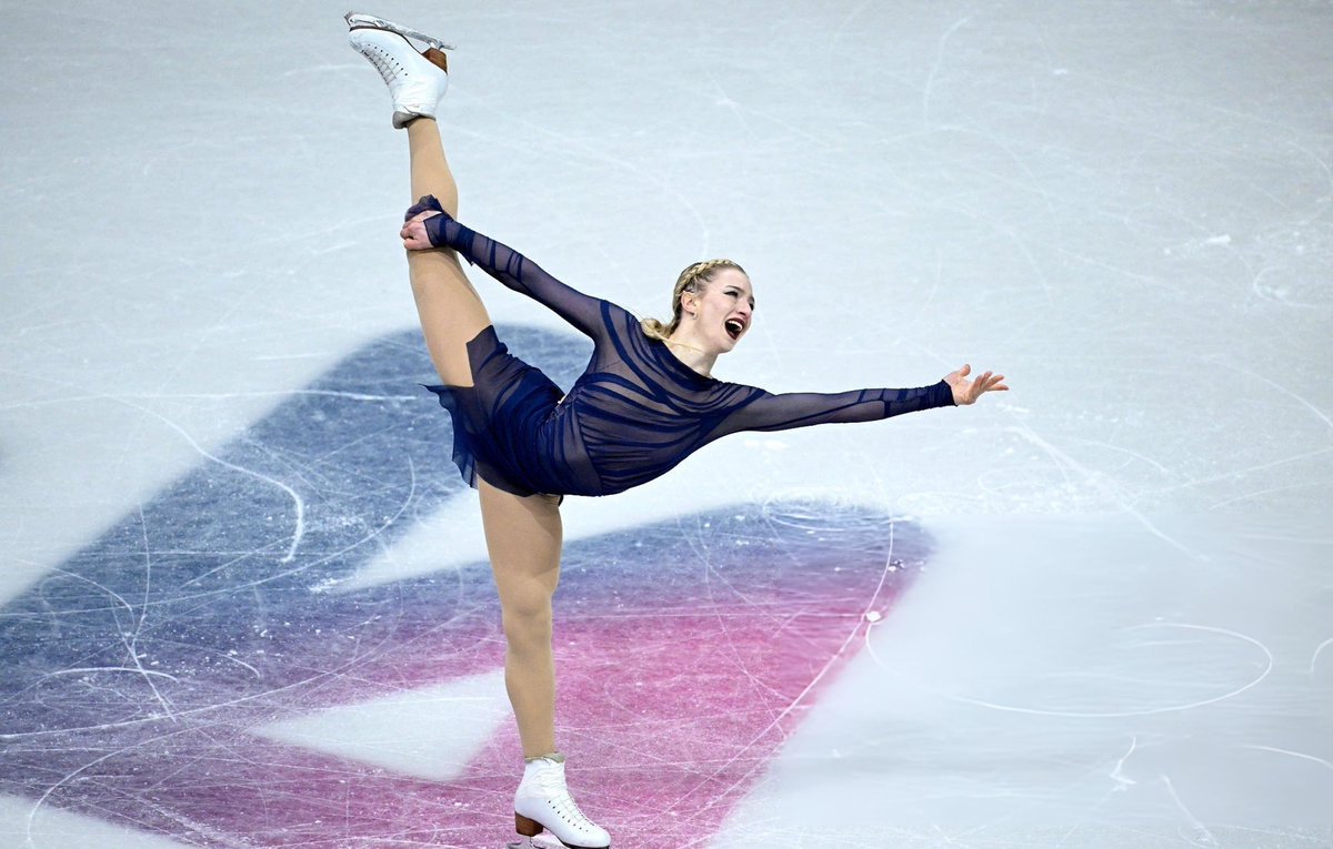 AmberGlennDaily's tweet photo. Her Olympic moment. Amber Glenn, forever an Olympian. 

📸: Wang Zhao https://t.co/JDEGTxqFk0