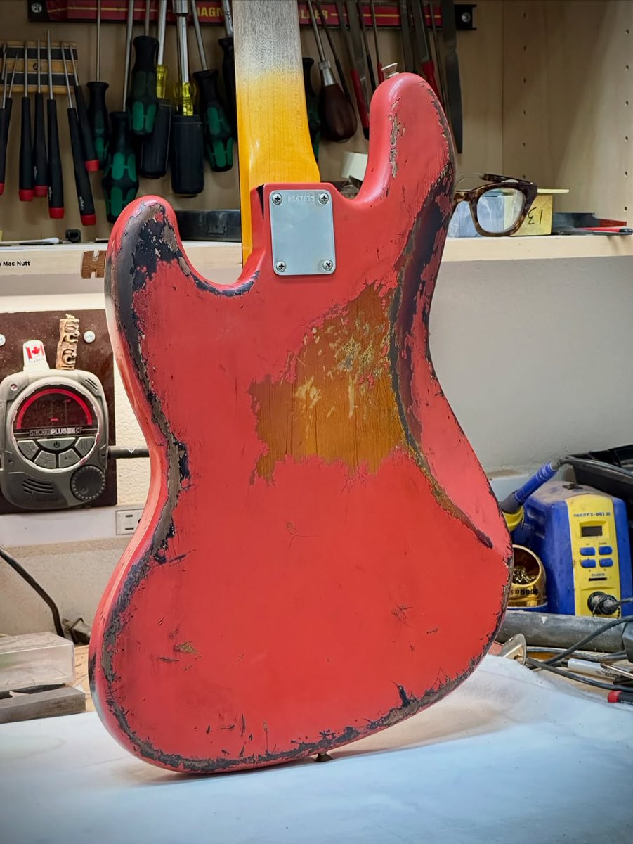 Fender's tweet photo. Austin MacNutt is back with another beauty. We're loving this stack knob Jazz Bass in Aged Fiesta Red over 3-Color Sunburst featuring a Spitfire Tortoiseshell pickguard— headed to The Music Zoo. https://t.co/l4iVDWWVPb