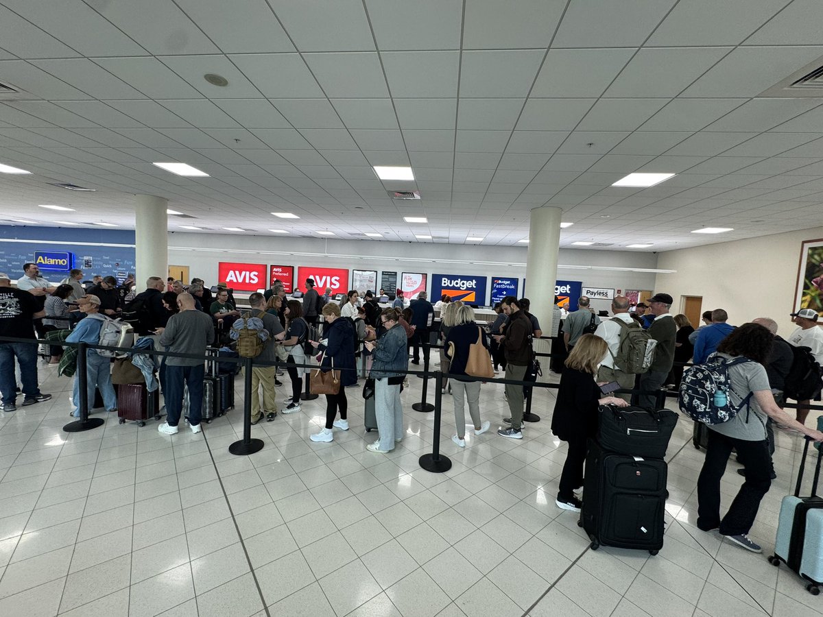 JohnMKnowles's tweet photo. Hey @RSWAirport &amp; @Budget, this is criminal. I landed at 10am today but won’t leave until Noon because of this line. How can you do this to people?

#travel #florida #naples #fortmyers #rentalcar #SWFL https://t.co/qxVhqBTAgc