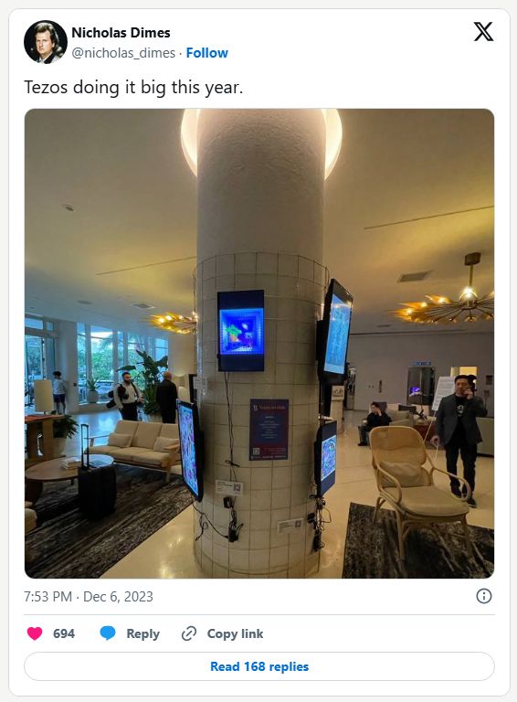 ryangtanaka's tweet photo. Interestingly enough, the last major conference I went to was Tezpole Miami 2023 (sorry, I think it had another name but I forgot), where I was immortalized as a meme on the #Tezos blockchain. (That's me in the back talking with the folks on @TeiaCommunity.) I figure I should quit while I was ahead because it wasn't gonna get any better than that. Looks like I was right. 😂

We're doing some planning for Tezcon 2026 this year in Seattle (July 11th near Capitol Hill), and we've settled on a theme - "Ensh*ttification". We all know Web3 is jank, crypto is jank, NFTs are jank, the markets are jank, politics is jank, the world itself is jank. Why hide it? Let's lean into it hard and have some fun. 😆

If you believe in the tech but don't mind talking or hearing some sh*t about the industry itself, this will be the anti-Conference event for you! Take it from the guy who didn't bother going to the main hall and hung around a pole for 3 days in a row because it was just too interesting not to. 💈

Still much appreciated for the meme, @realTheoWayne 🙏