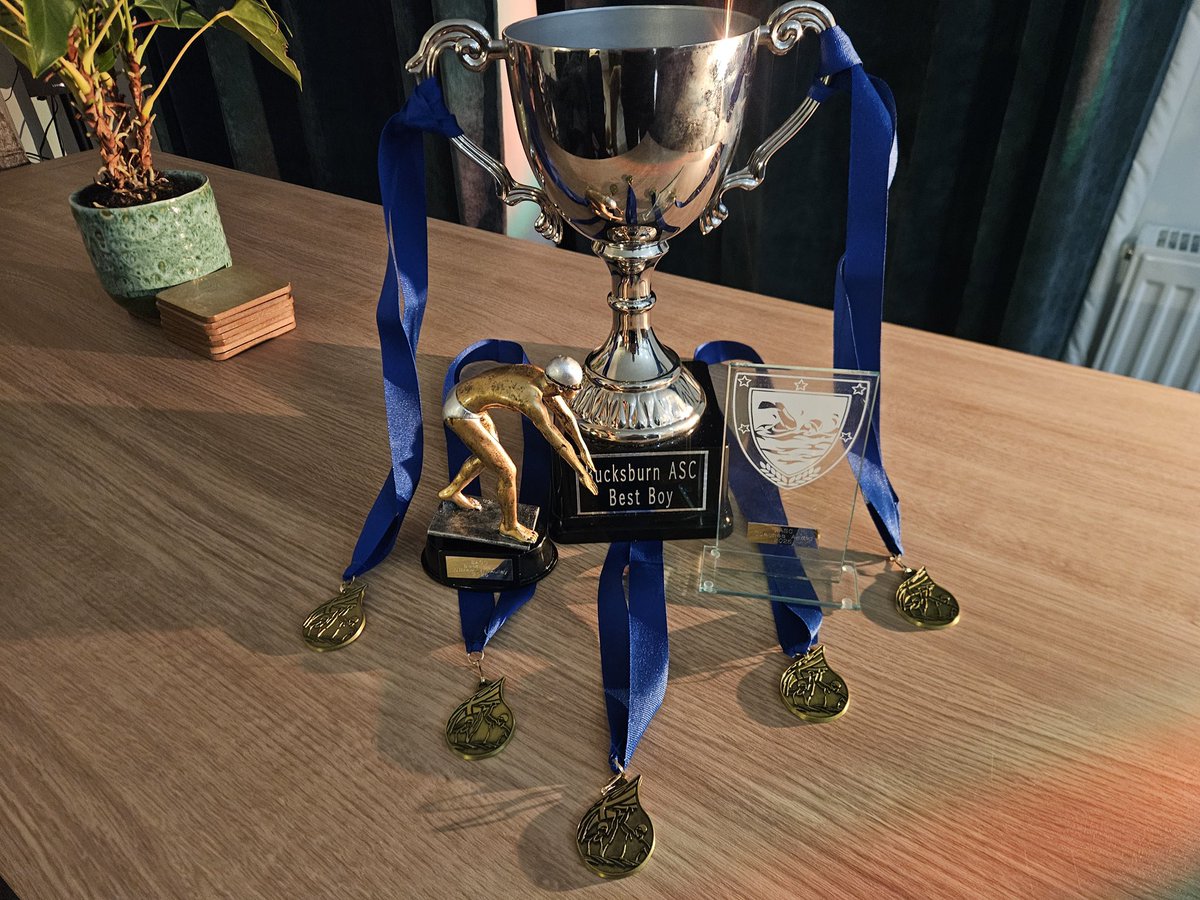 hazleheadschool's tweet photo. Big shout out to this talented swimmer who was awarded 5 Gold Medals for swimming events as part of Bucksburn Swimming Club celebration last night . 
He was also awarded The Coaches Award ⭐️⭐️⭐️⭐️
#AFCCTCommunityCup
@AFCCT
@TAQAGroup https://t.co/CRc3PjBTH6