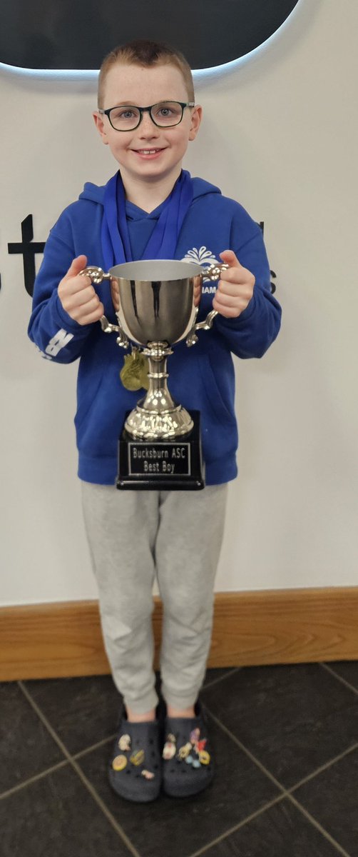 hazleheadschool's tweet photo. Big shout out to this talented swimmer who was awarded 5 Gold Medals for swimming events as part of Bucksburn Swimming Club celebration last night . 
He was also awarded The Coaches Award ⭐️⭐️⭐️⭐️
#AFCCTCommunityCup
@AFCCT
@TAQAGroup https://t.co/CRc3PjBTH6