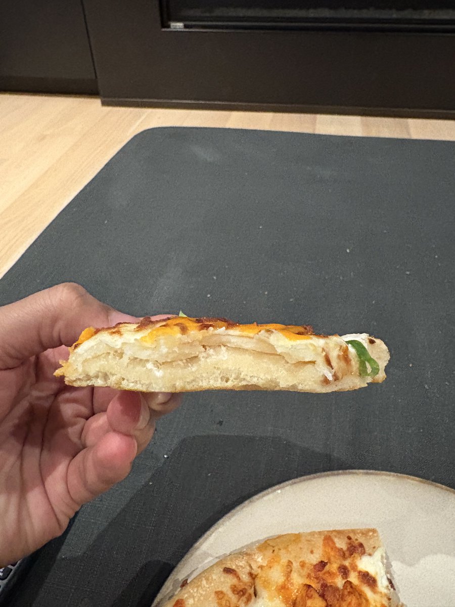 r2smooth1's tweet photo. @bostonpizza this is what you get for $40. I haven’t come across a pizza so thin and pretty much all dough https://t.co/pokAH0WaU7
