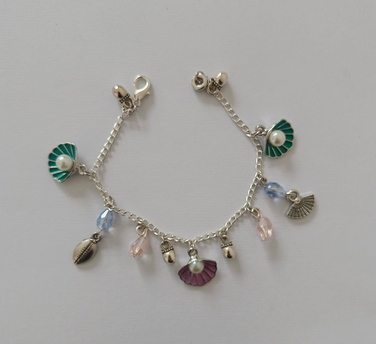 tikulli's tweet image. Chain charm bracelets. Last two remaining. DM to purchase. Share to support my work. #fashionfinds #giftforher #JewelryStyle #handmadegifts