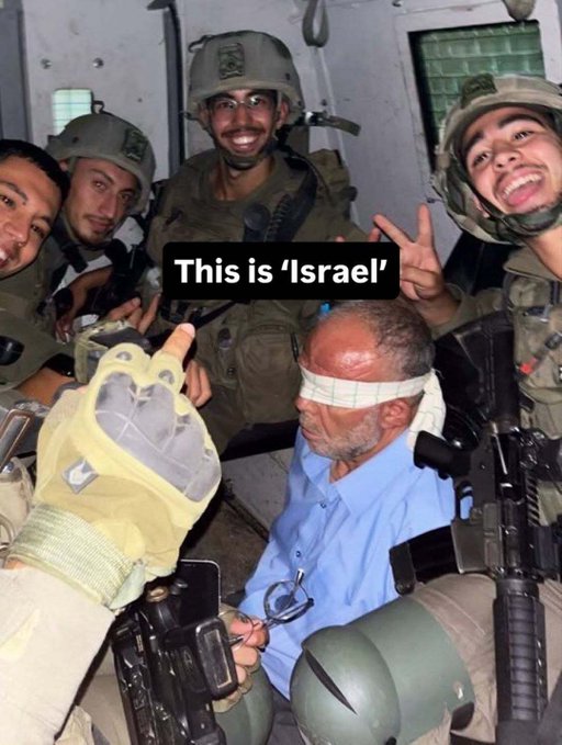 Most moral soldiers take a mocking selfie with a Palestinian elderly who was kidnapped from his home in occupied Hebron