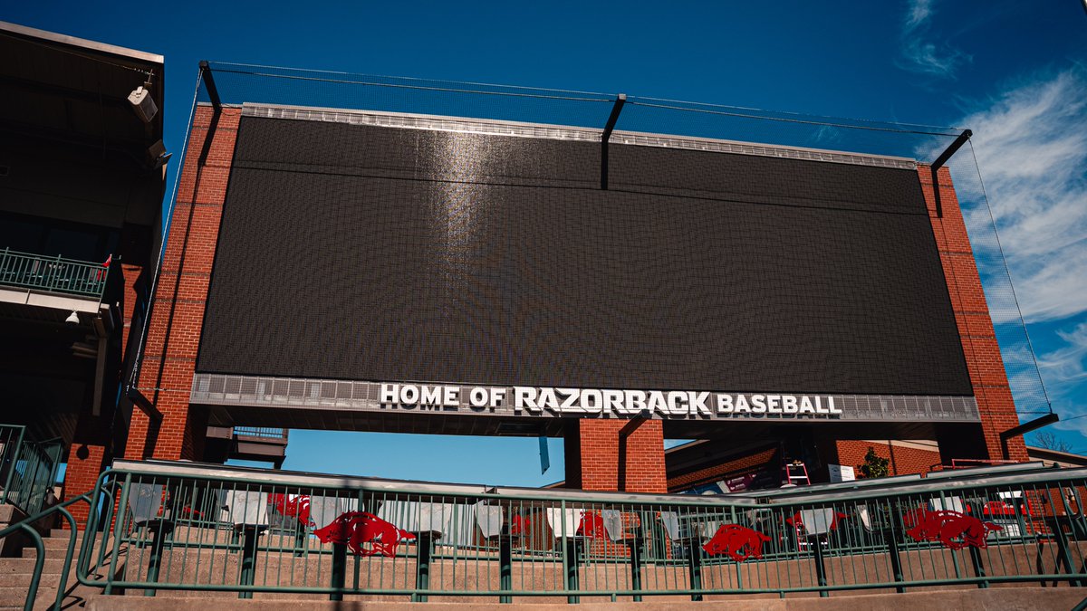 RazorbackBSB's tweet photo. BIG-time upgrade at Baum-Walker 👀

Thanks to a generous gift from the Willard &amp; Pat Walker  Charitable Foundation, JM’s HogVision is a 19.25-foot-tall by 55-foot-wide board, providing 1,059 sq ft of digital space for HD video, instant replays, graphics, in-game stats and info. https://t.co/cD0aASXYCa