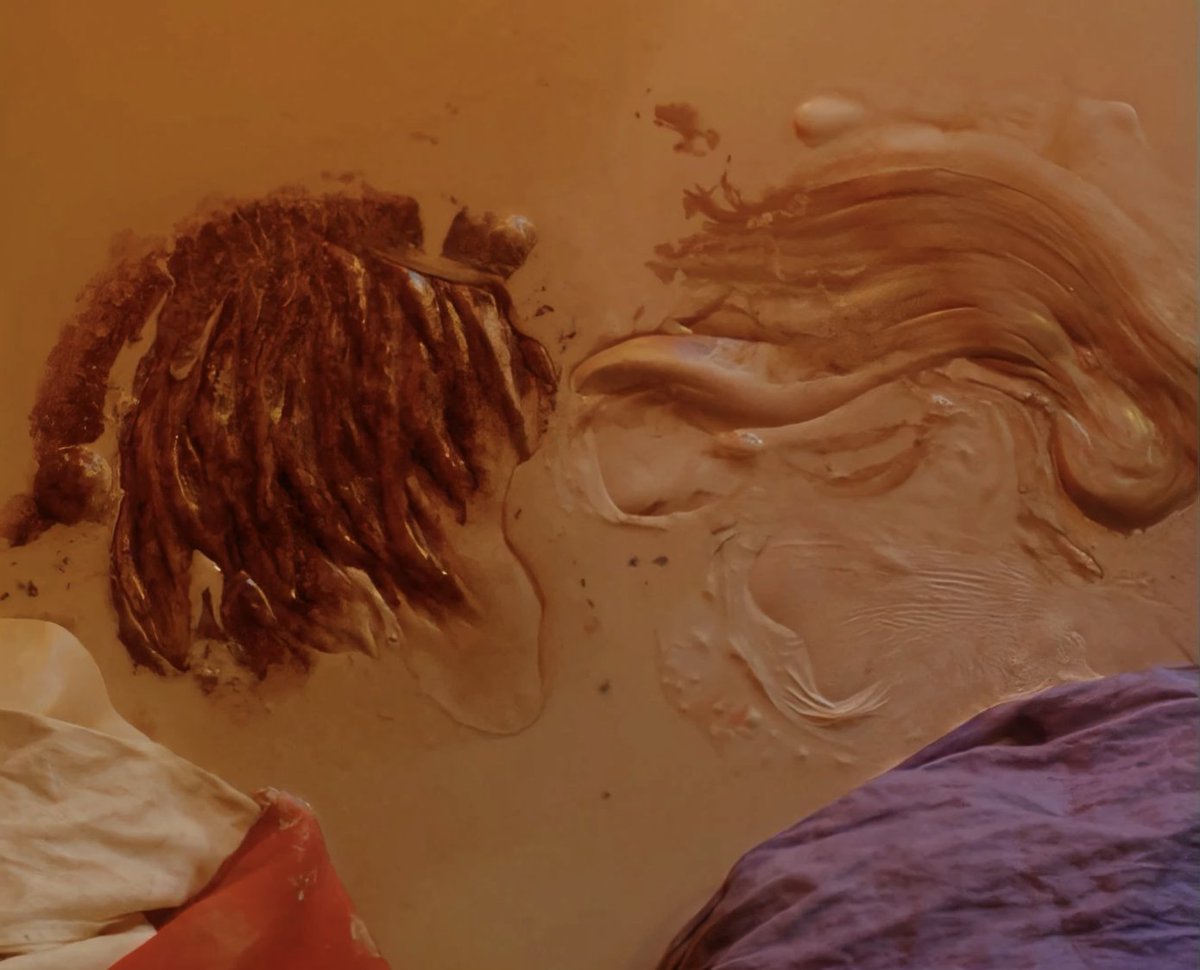 final scene of instant crush, 2013, two wax figures melt into each other