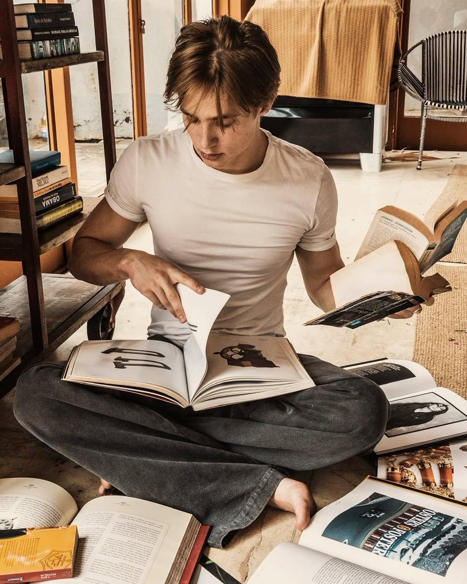 Look at this cute boy reading, serious research