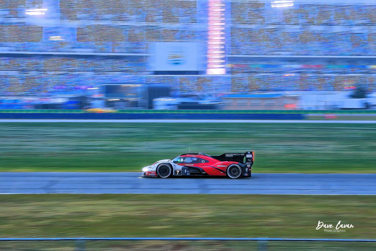 #motorsportphotography #rolex24hours A wide angle pre-dawn Sunday morning shot of the Penske Porsche number 7 on its way to victory lane (in the blurry background) in about 7 hours. after the longest ever yellow flag in 24 hour racing (over 6 hours). #imsa