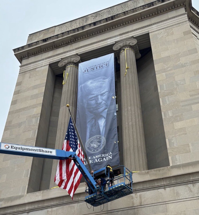 This banner of Donald Trump on the DOJ headquarters building is giving 1930s Germany vibes.