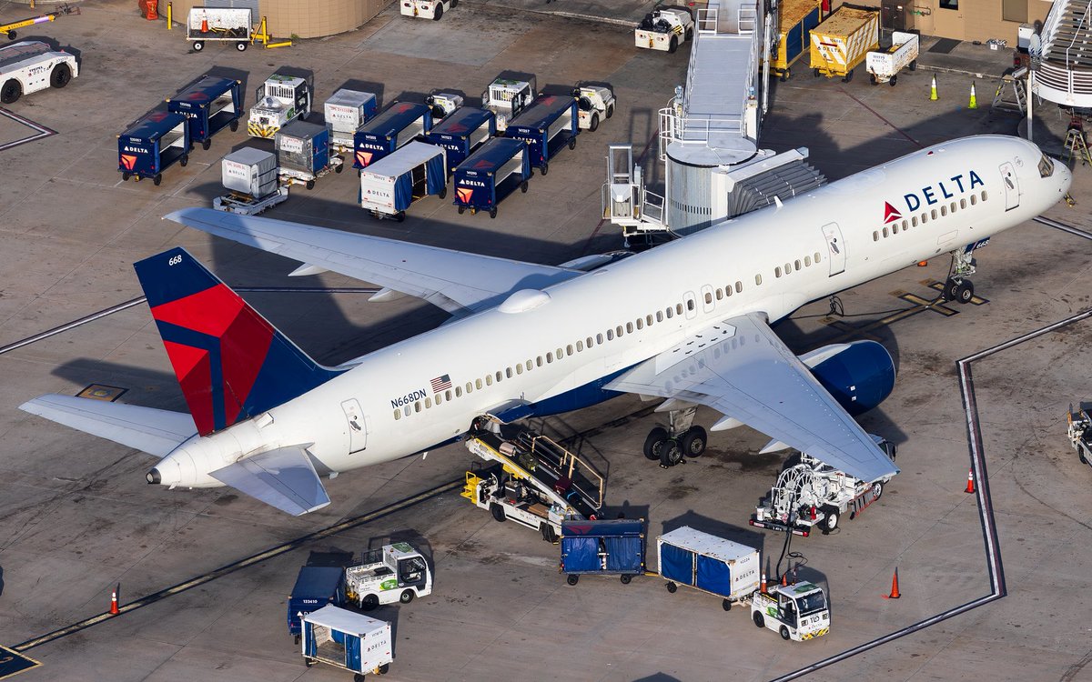 A Delta 757 parked at the gate at MCO. 

The 757 flew for the first time 44 years ago today in 1982!