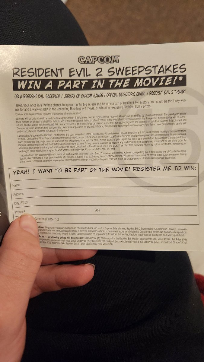 Anthony33339167's tweet photo. Ya know, I love buying used games in good condition, the manual for my copy of Resident Evil 2 still has the movie sweepstakes bit in it...hey @CapcomUSA_ , this still good for anything? May be a bit out of date, but considering the film never happened, I feel it's fair. https://t.co/aGVWlbVoBG