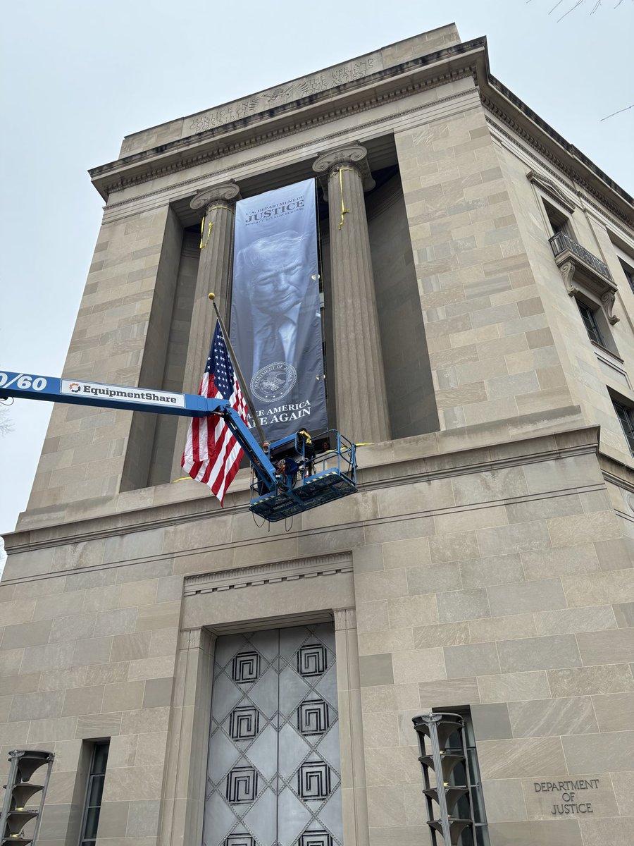 BREAKING: This banner just went up at the Justice Department. The symbolism of this is striking. The DOJ is supposed to be independent of the White House. That is long gone. This is Trump’s justice system and he’s weaponizing it with impunity.