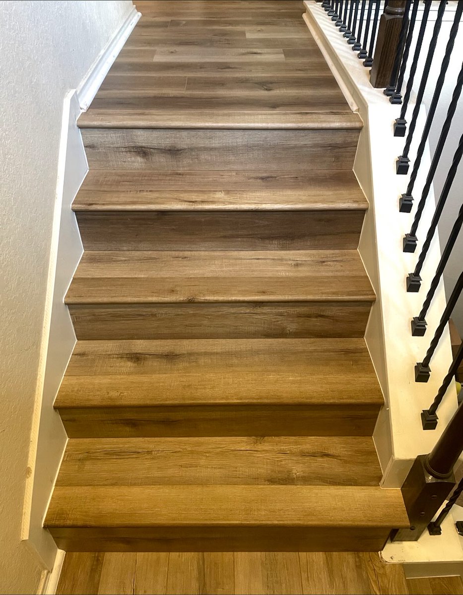 Still can’t get over this install 🤍 That staircase is a showstopper — wrapped in our Bella Vista Series laminate.

AC-5 rated, water-resistant, and EIR textured for true wood realism. Built for heavy residential &amp; light commercial use. ✨