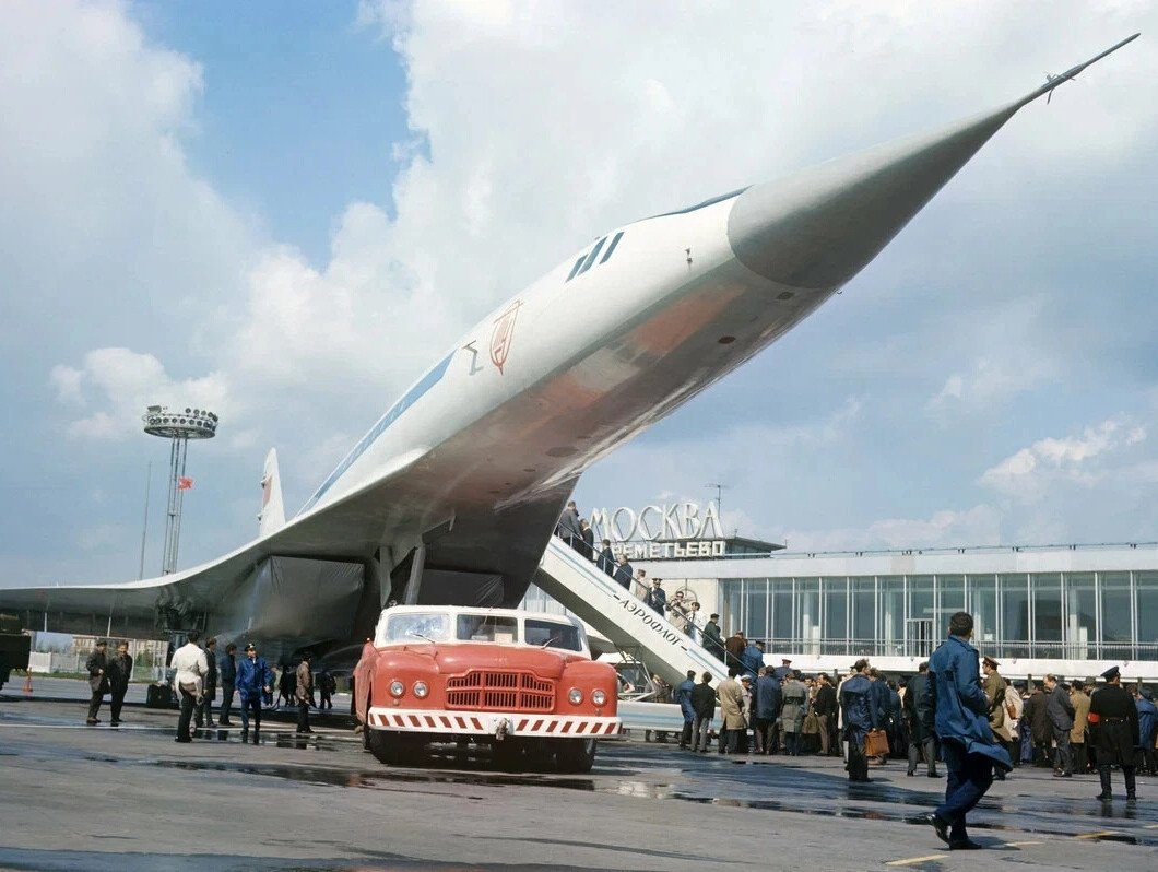 "The Tu-144 and MAZ-541 Giants"

Towing the Tu-144 SSSR-68001 supersonic passenger aircraft prototype using a MAZ-541 airfield tractor during a presentation for reporters and civil aviation specialists at Sheremetyevo Airport in May 1969.

The MAZ-541 is a Soviet airfield tractor