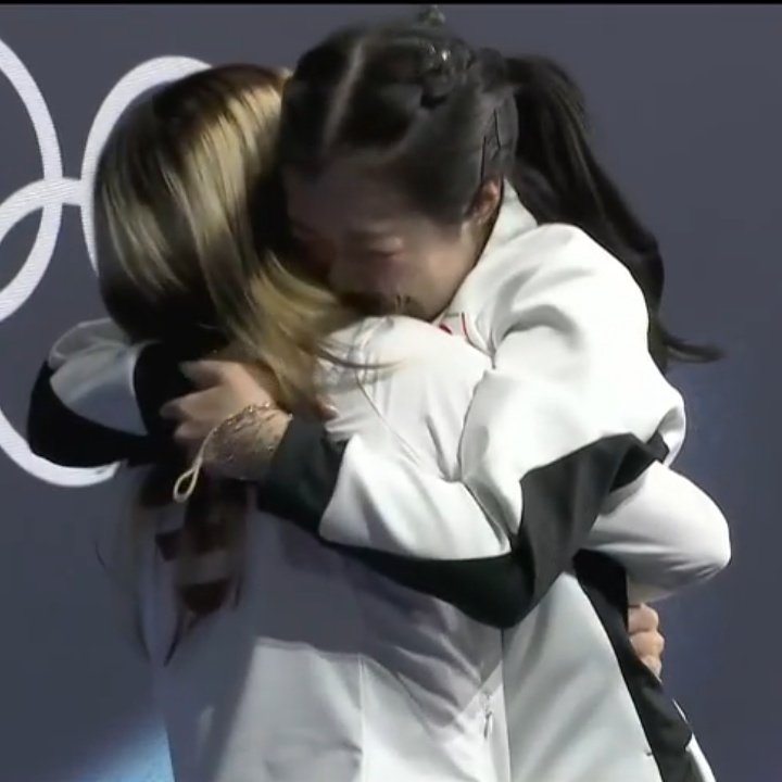 nanawithchu's tweet photo. podium besties! ami nakai being carried by alysa liu and then jumping together i am so happy for both of them #figureskating https://t.co/P0uL2oRc9E