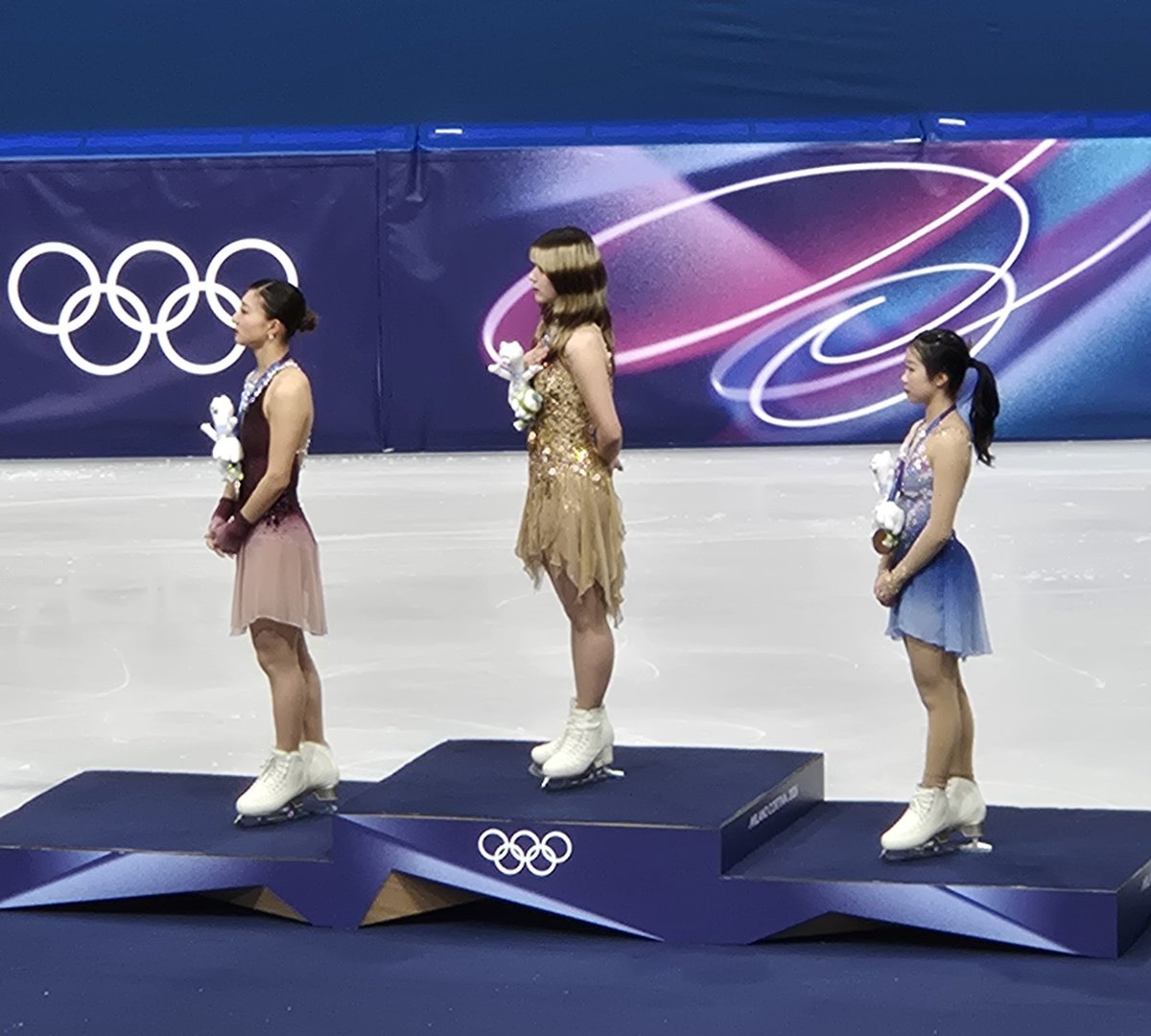 They're all wearing the mascot stuffed animal in their medals 😭😭😭