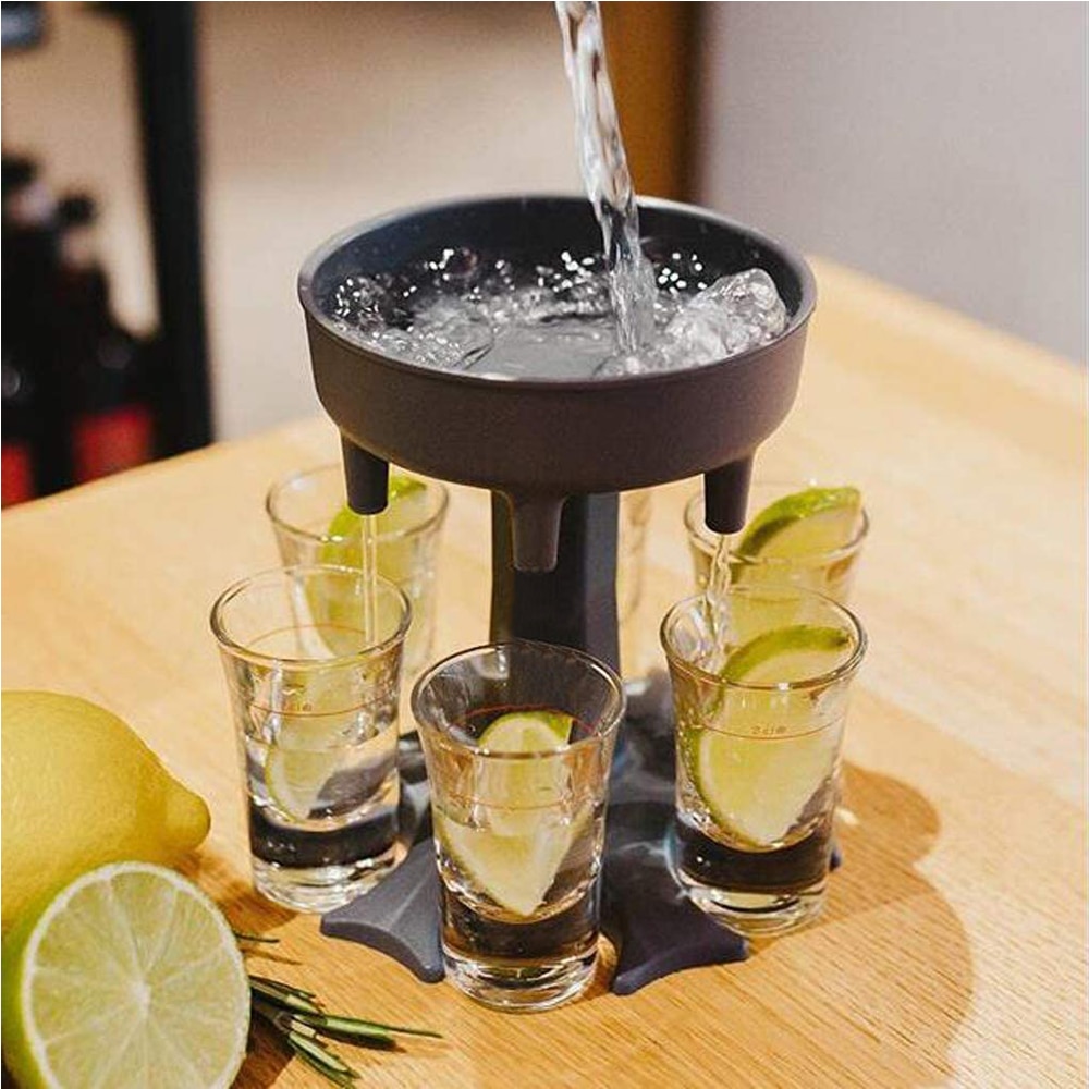 UnicunShop's tweet photo. Tired of filling shot glasses one by one? 😩 Our 6-Shot Glass Holder &amp; Liquor Dispenser lets you fill SIX at once! 🎉 Party time just got easier (and funnier)!  https://t.co/AdC2OgTmeE 🥃🥳  #partyhacks #shottime #liquordispenser https://t.co/H8NZC3cZJB