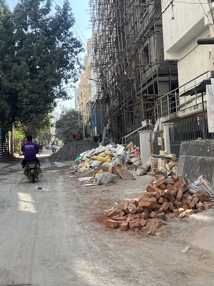 isanketsaha's tweet photo. Is this legally allowed to use public road to stack cement and brinks and block public usage ? @GHMCOnline  @CommissionrGHMC @TelanganaDGP https://t.co/MKt5jCeTI0