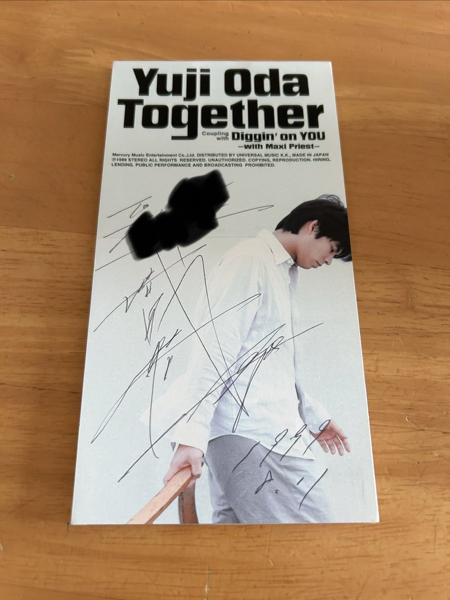 昔、織田裕二さんからいただいたCDとサイン 確かにお名前聞かれて書い