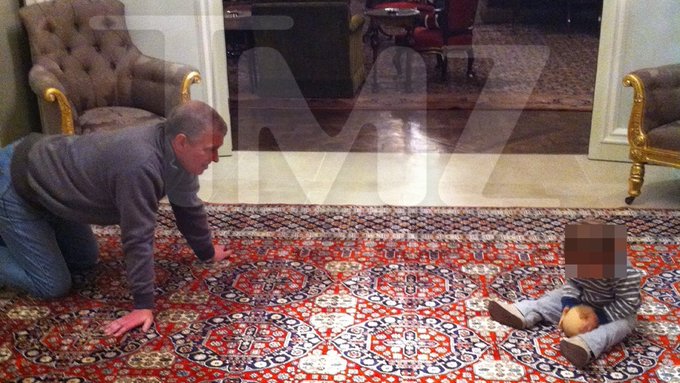 BREAKING: A newly released photo shows former Prince Andrew preparing to make contact with an unidentified toddler.