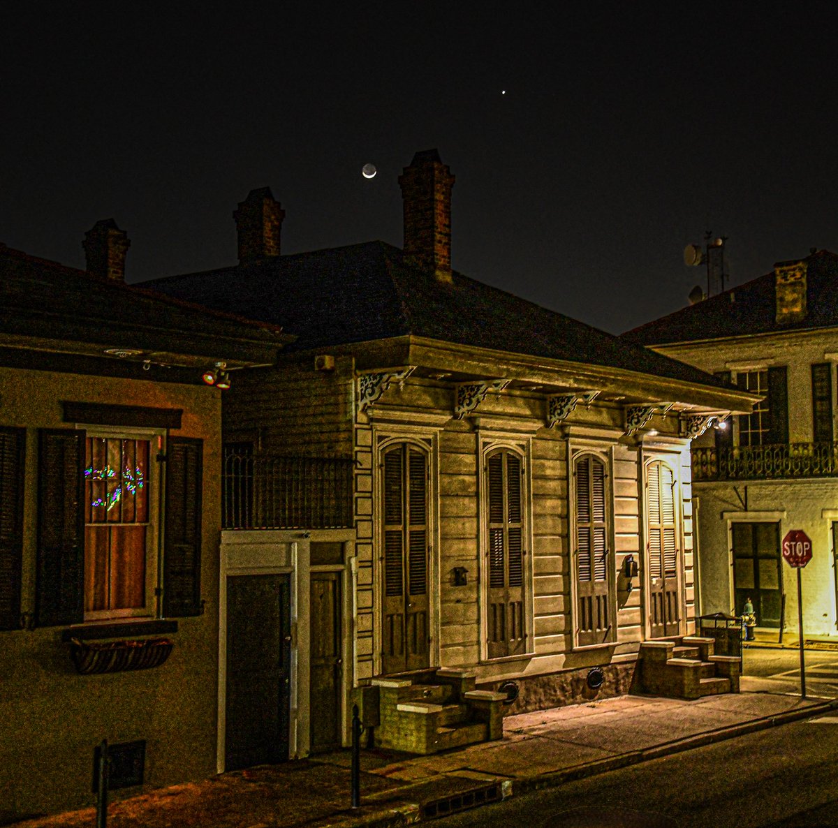 Crescent moon setting over the quarter, Ursulines at Burgundy, New Orleans