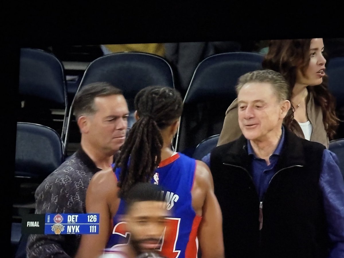 Rick Pitino and Stevie Mas congratulate Daniss Jenkins after the Pistons win