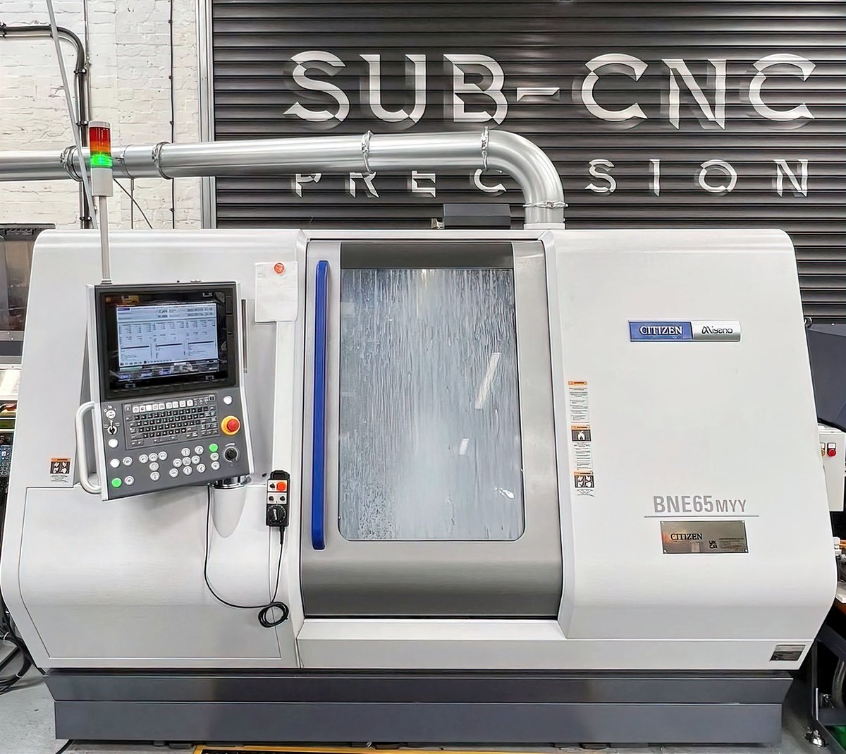 Standing in front of their fantastic backdrop, the #CitizenCNC