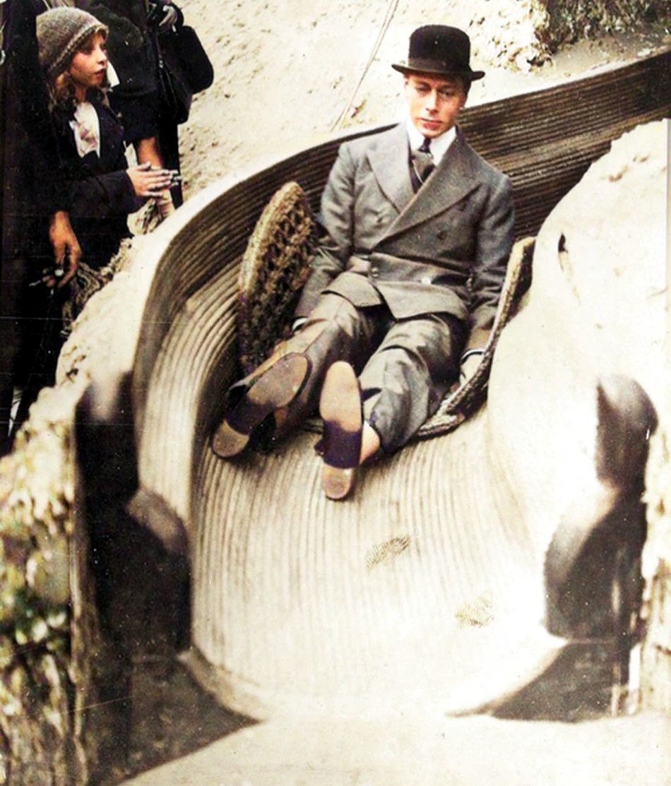 nieradahrabina's tweet image. RT @englandincolour: The Duke of York, later King George VI, goes down a slide at the Wembley exhibition in 1925.