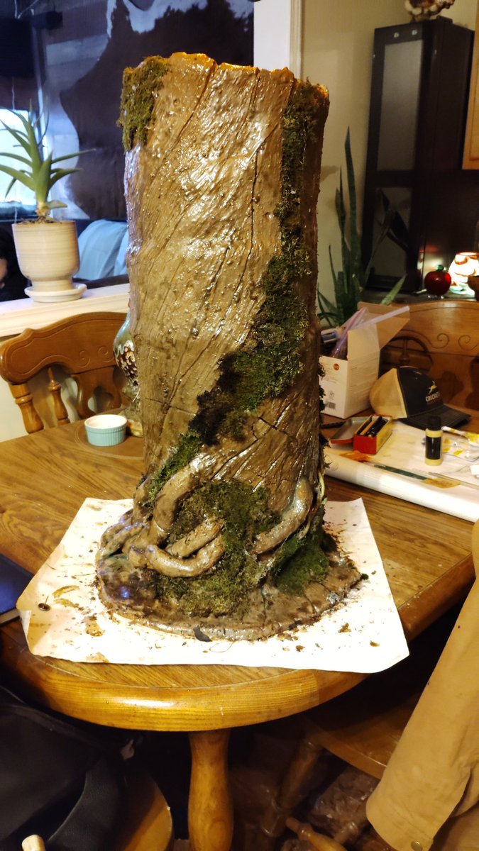 I've been away from my computer for a while now, don't know when I'll be back to it, so in place of my regular art take my 25 pound clay sculpture instead