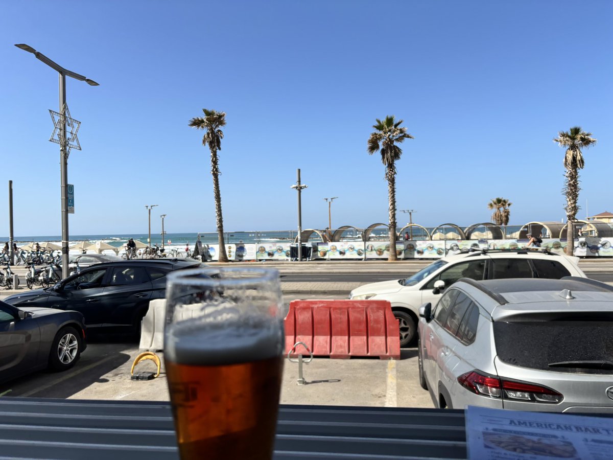 Do not question my dedication to a good time. After a day of travel the beach front and a beer, or two