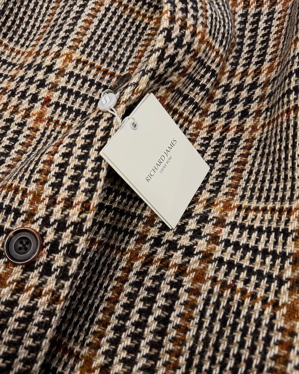Wrap up in this season’s English-woven nut brown pure new wool check belted overcoat, available at Richard James, 29 Savile Row.